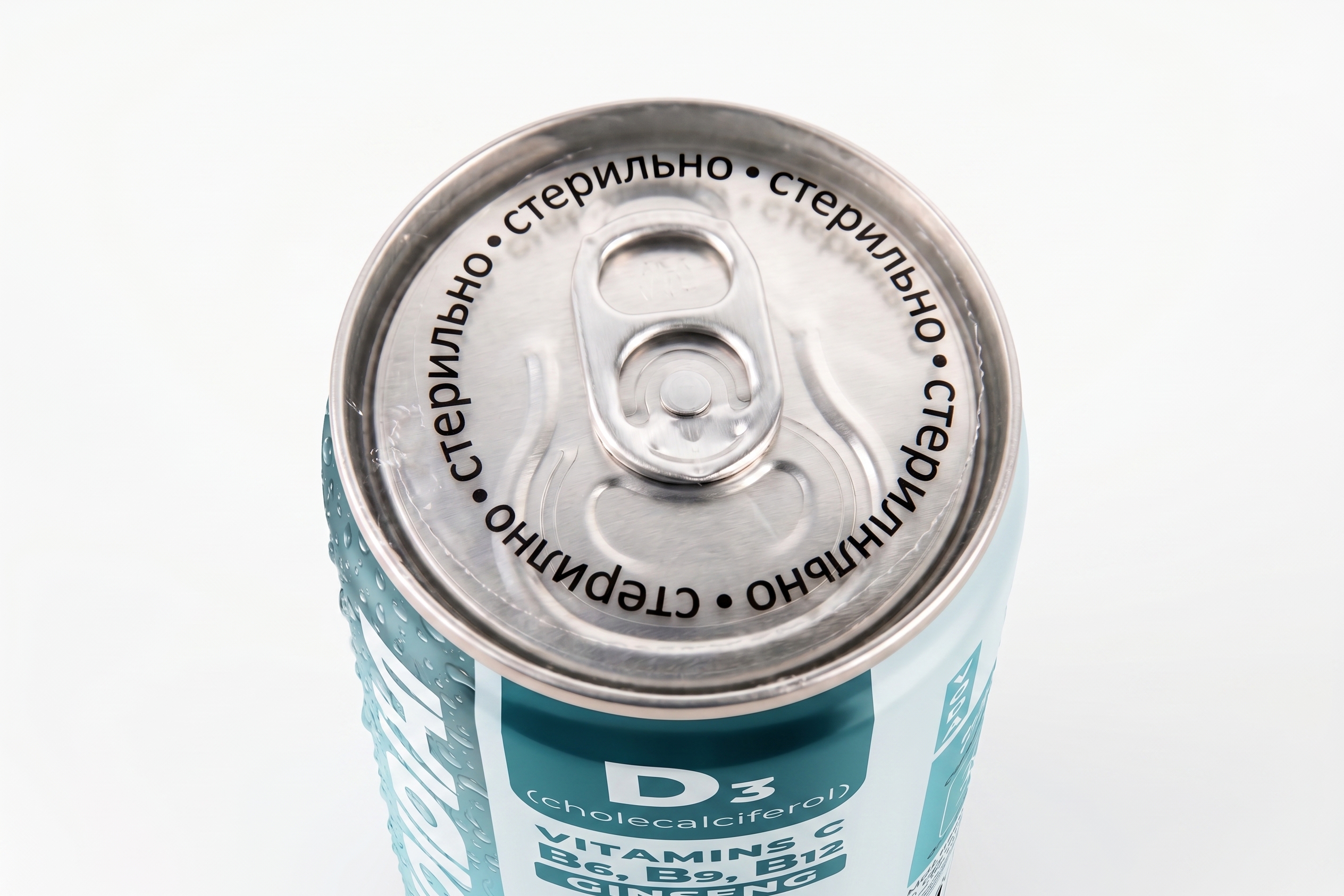 Макро-фото защитного колпачка на банке V.O.D.A
